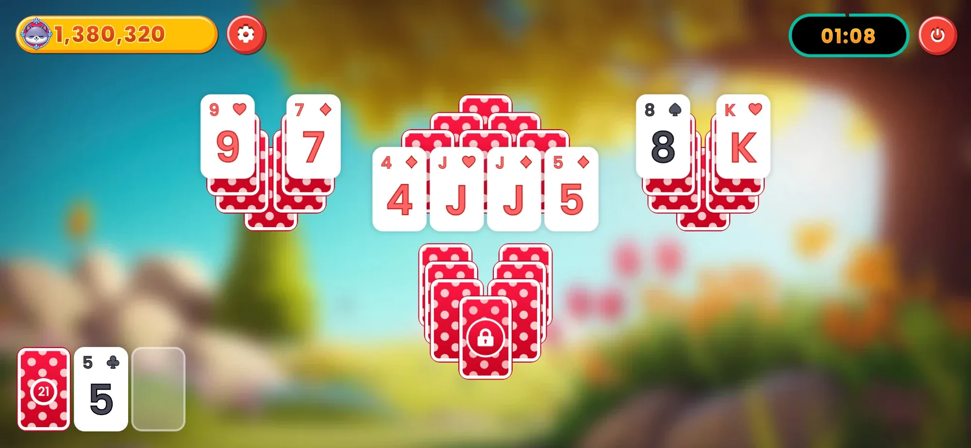 A Solitaire Masters board spread across four card clusters, with face-up cards around a locked centre stack